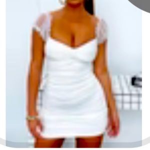 White dress NEW, with tags. From THATS SO FETCH. size Small, NEVER WORN. Tight.